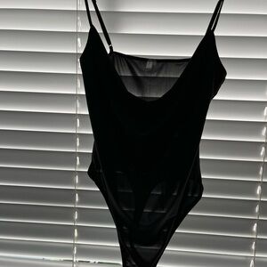 Out From Under Bodysuit: Black Solid
Tops - Size Medium with thong bodysuit.